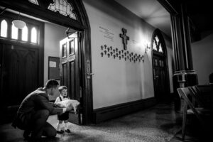 Ring bearer in church crying