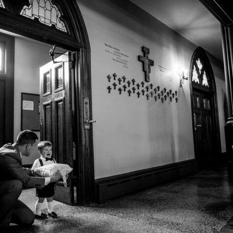 Ring bearer in church crying
