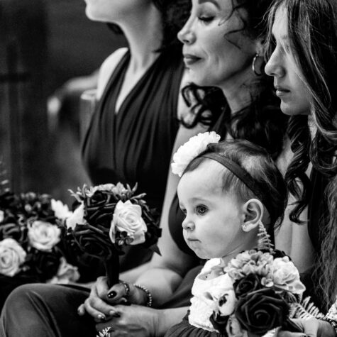 Flower girl with bridesmaids black and white in church