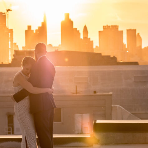 Bride and groom NYC Rooftop wedding sunset