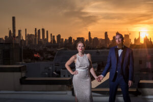 Bride and groom NYC Rooftop wedding sunset