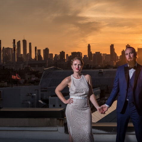 Bride and groom NYC Rooftop wedding sunset