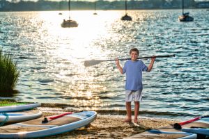 boy with paddle board