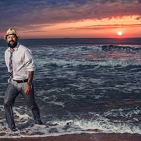 Sunrise walking in ocean fully clothed