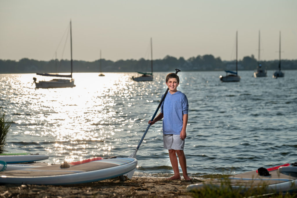 boy with SUP paddle board