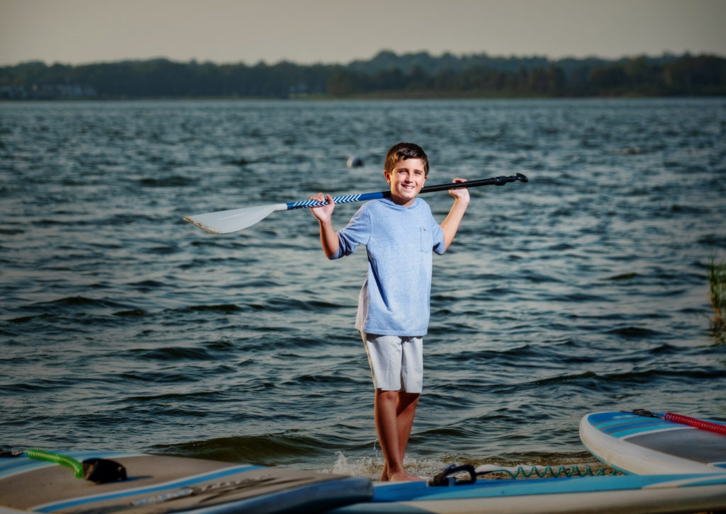 boy with SUP paddle board