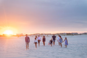 Family candid sunset beach