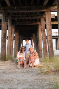 family under pier