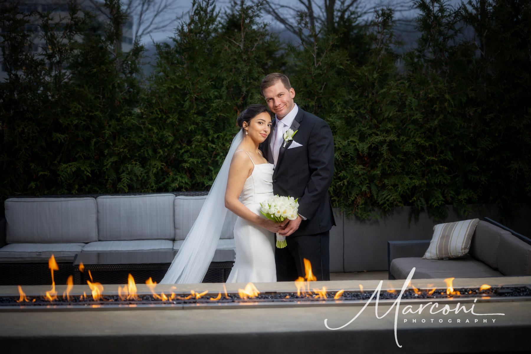 Bride and groom outdoor fire