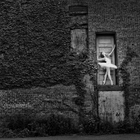 Senior girl ballet dancer on wall