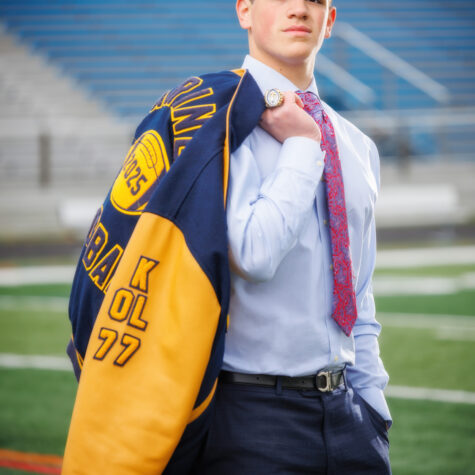 Senior football player in suitSenior football player in suit