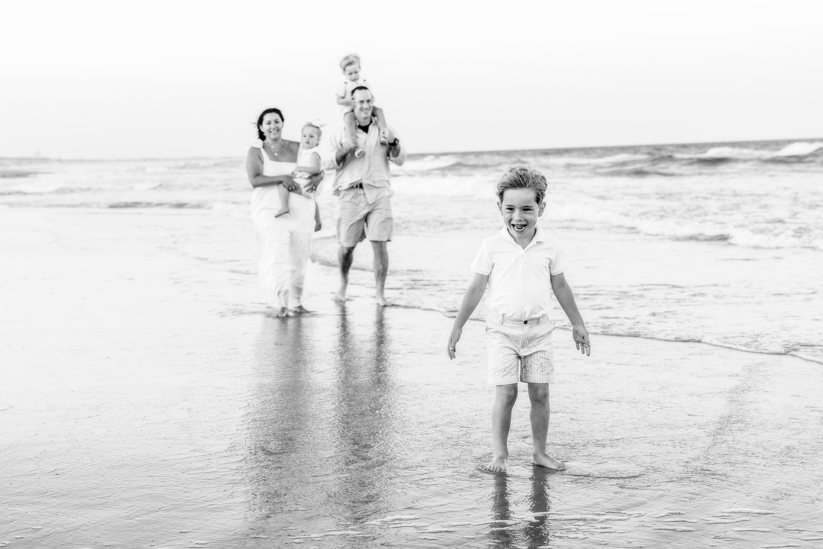 Family beach black and white