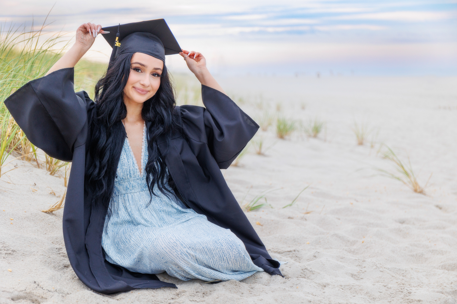 cap and gown on beach