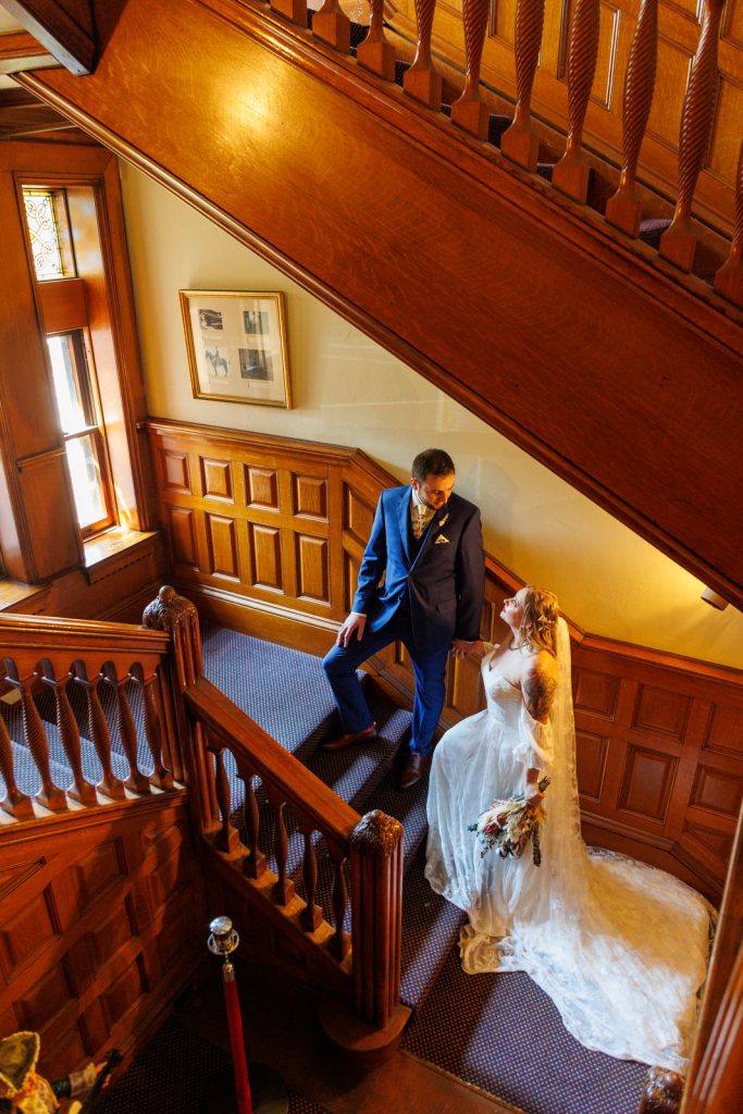 Bride and groom castle staircase