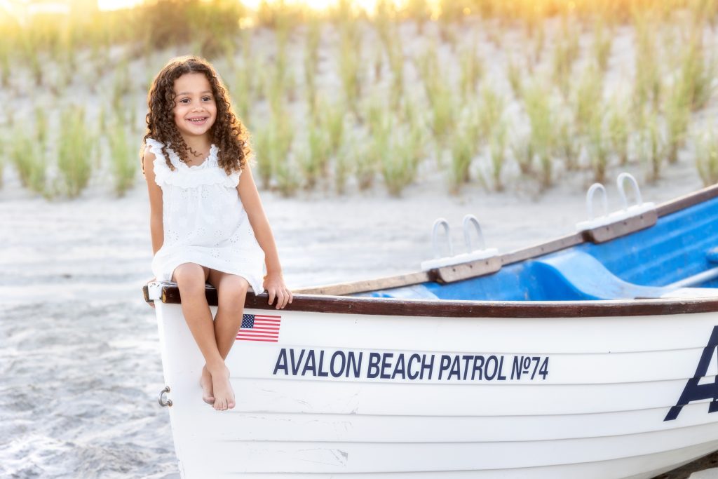 Girl on Avalon lifeguard boat