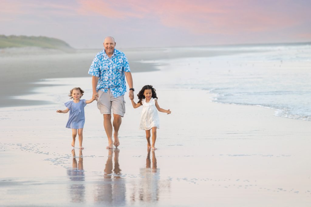 Grandparents and grandchildren on beach