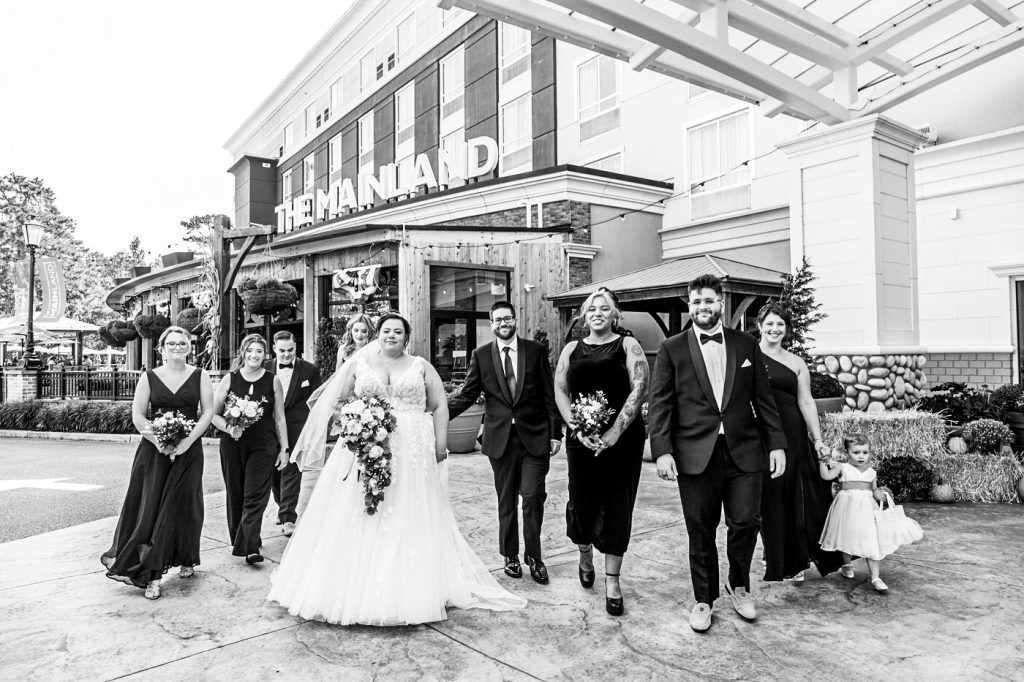 Black and white bridal party walking