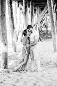 Engaged couple on beach