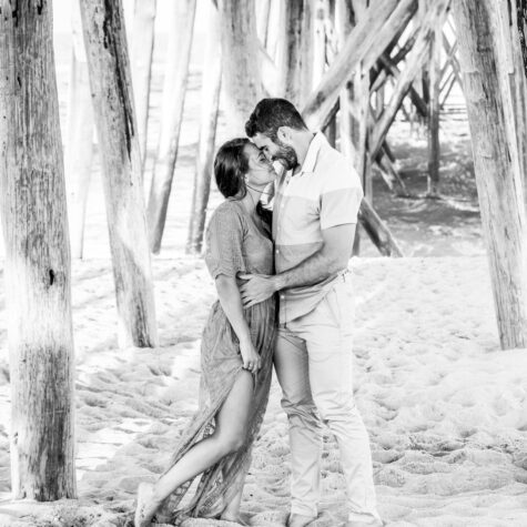 Engaged couple on beach