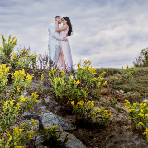 engaged couple on cliff deal NJ beach