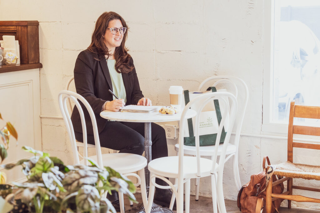 Coffee shop cafe table laptop woman working