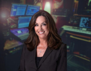 Female headshot in music recording studio