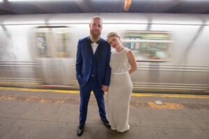 Bride and groom in subway train