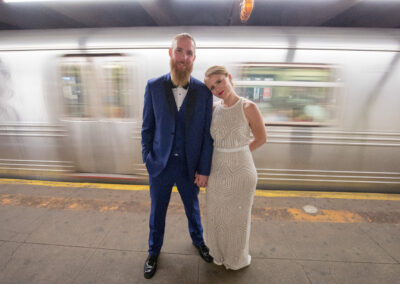Bride and groom in subway train