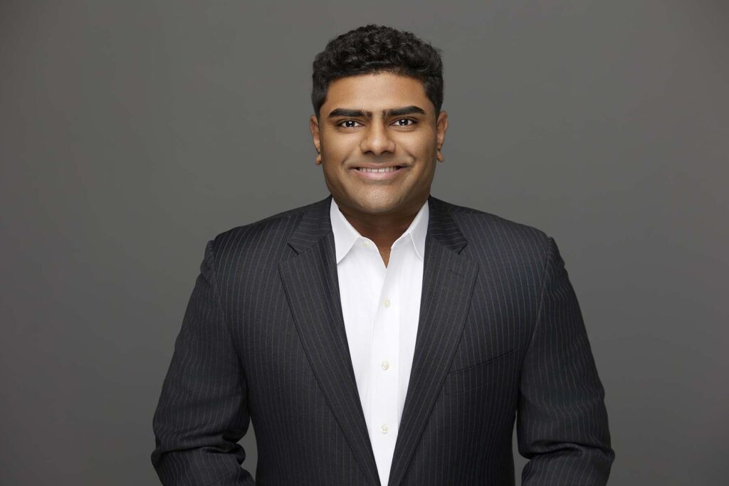 Headshot photo of business man in suit 