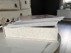 Mounted photos in box