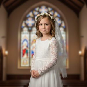Girl in communion dress in church portrait