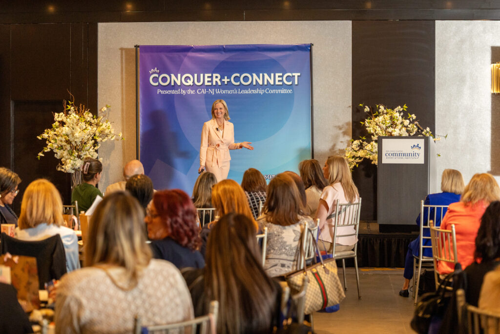 Patricia Stark keynote speaker on stage in front of audience 